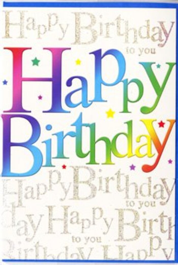 Set against a soft, neutral background, this birthday card design seems to glow with the lively spirit of a Beckton celebration, as if it were catching the light from a nearby kitchen window on a party morning. At its heart, the phrase Happy Birthday is displayed in generously sized, contemporary letters that stretch confidently from one side of the card to the other. Each letter is cloaked in a rich gradient of colour: deep cherry and berry shades slide into juicy tangerines, then into radiant yellows, followed by fresh grassy greens and cool aquatic blues. The transitions are smooth and velvety, giving the impression of carefully blended pigments, much like the way Florist Beckton layers tones in a bright birthday bouquet destined for a home near Tollgate Road. Behind this central message, the entire backdrop is covered in fine, looping gold writing, repeating Happy Birthday to you in a script that feels both elegant and friendly. The gold ink carries a delicate shimmer, not overpowering but catching small highlights so that the script seems to twinkle gently when viewed from different angles. Tiny, scattered specks and stars of colour drift across the surface, as if confetti were frozen in mid-descent, adding to the feeling of a party paused in a joyful moment. The card surface looks smooth, perhaps with a semi-gloss finish, giving the design a subtle reflective quality that enhances its brightness. The combination of bold rainbow lettering and delicate golden background script creates a layered, heartfelt impression-the sort of birthday card you might send with fresh flowers across Beckton to show someone that their special day deserves both colour and care.